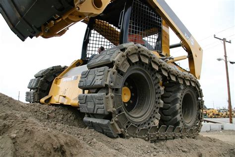 over tire skid steer tracks|skid steer wheels vs tracks.